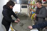  Zsuzsa Kroll, visually impaired expert, inspects the clay sample at sculptor Imre Berze’s workshop